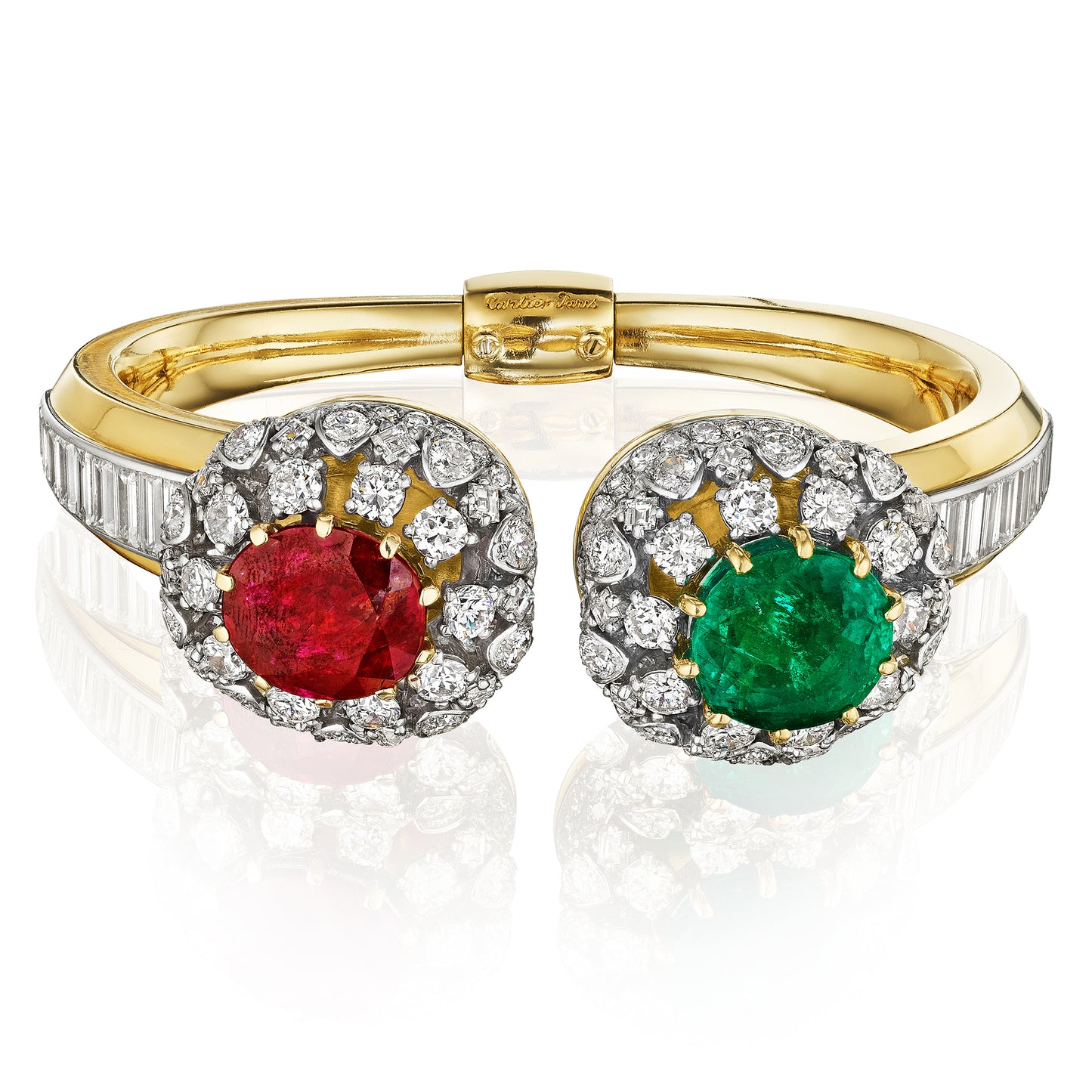 RUBY, EMERALD, AND DIAMOND CUFF BRACELET BY CARTIER, PARIS, CIRCA 1943