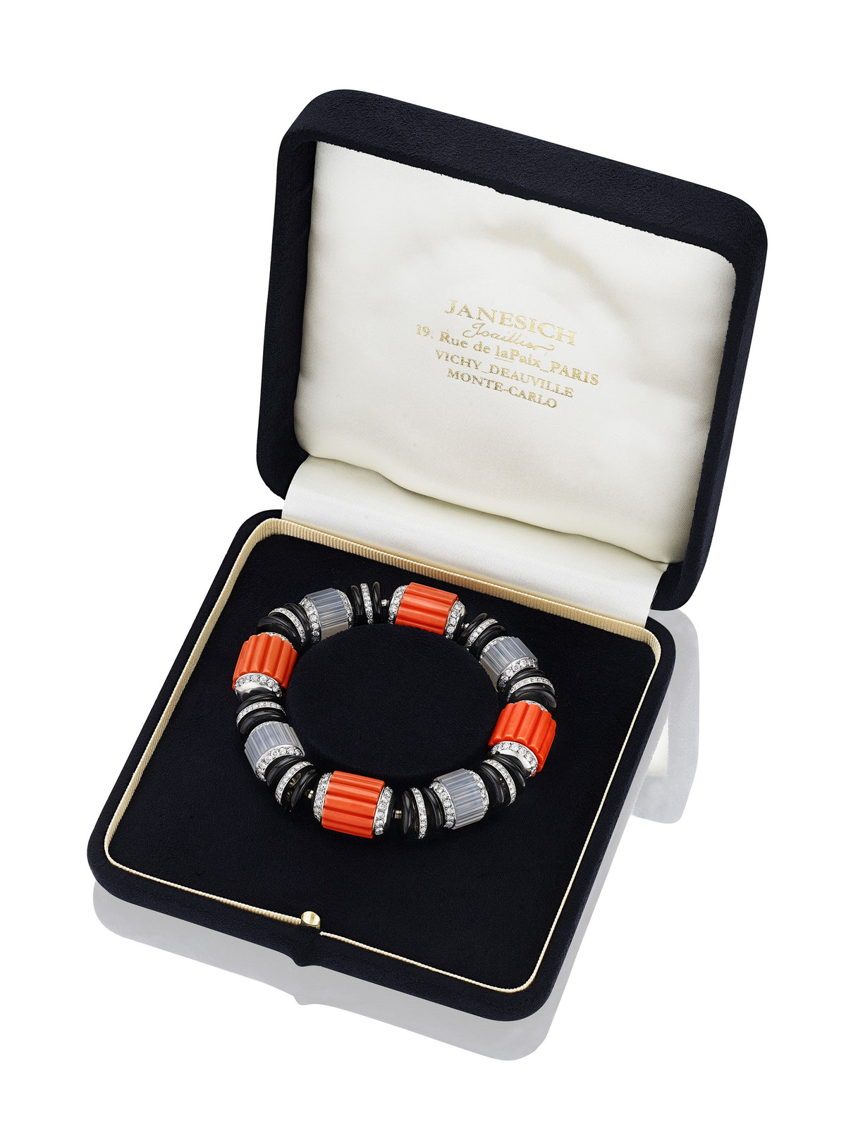 Art Deco Diamond, Coral, Rock Crystal, and Onyx Bracelet by Janesich, Paris, circa 1925