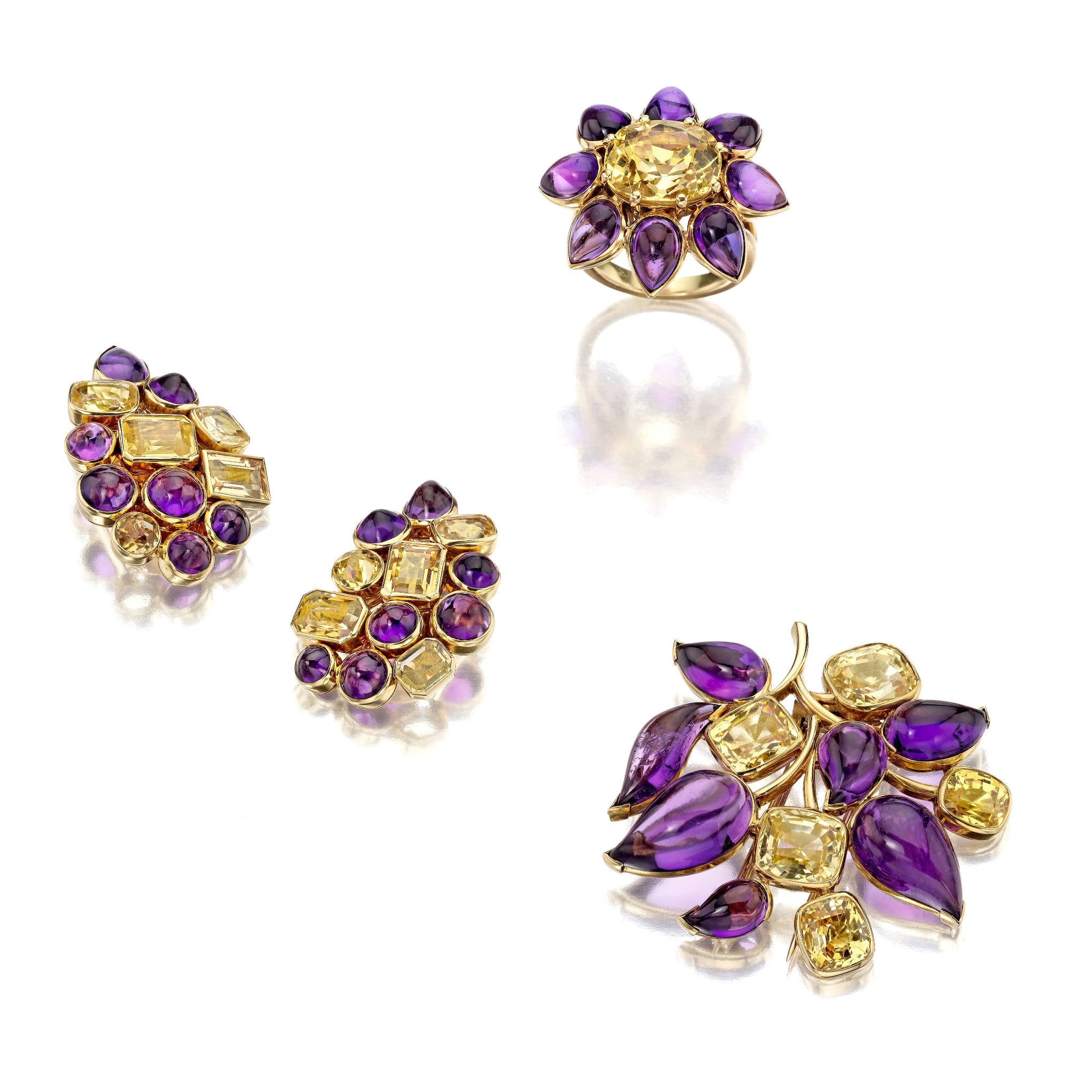 SUITE OF AMETHYST, YELLOW SAPPHIRE, AND CITRINE BROOCH, EAR CLIPS, AND RING BY SUZANNE BELPERRON, PARIS, 1951
