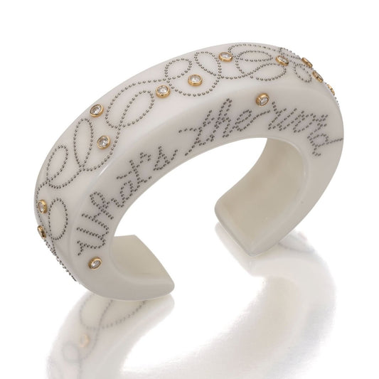 BAKELITE, STEEL, GOLD, AND DIAMOND CUFF BRACELET BY DANIEL BRUSH, NEW YORK, CIRCA 2004
