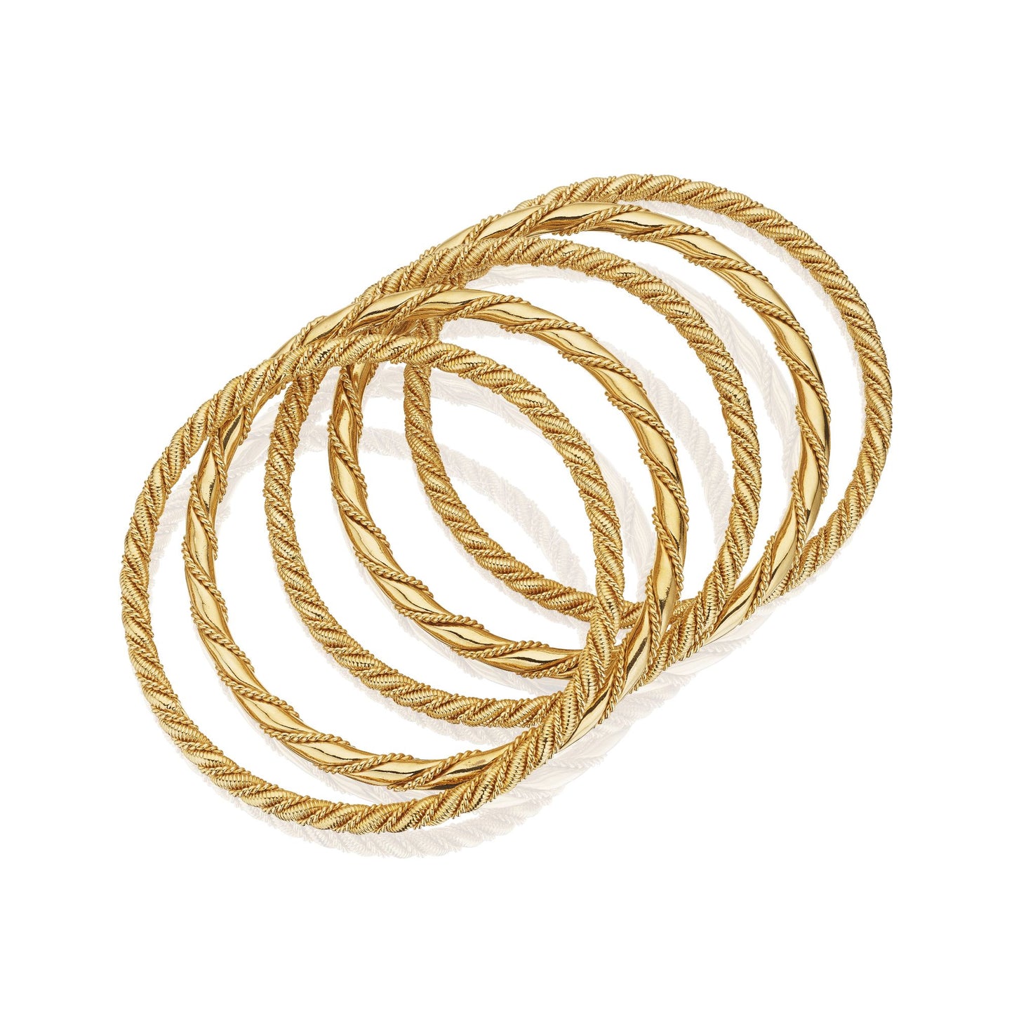 FIVE GOLD ROPE TWIST BANGLE BRACELETS BY CARTIER, CIRCA 1950