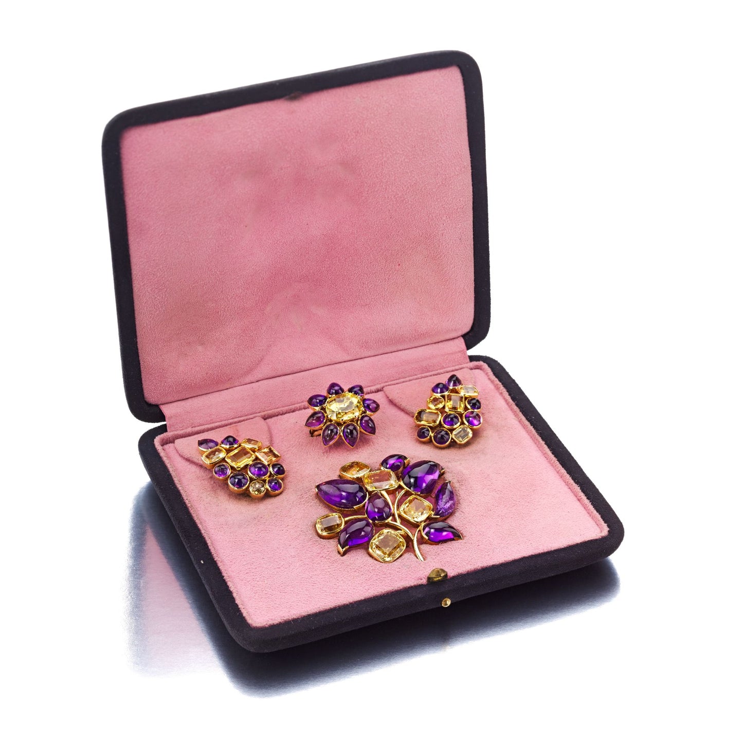 SUITE OF AMETHYST, YELLOW SAPPHIRE, AND CITRINE BROOCH, EAR CLIPS, AND RING BY SUZANNE BELPERRON, PARIS, 1951