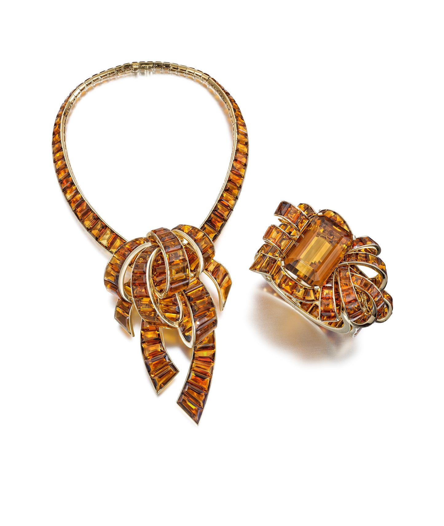 MODERNE CITRINE AND GOLD NECKLACE, BROOCH, AND BRACELET SUITE BY TRABERT & HOEER-MAUBOUSSIN, NEW YORK, CIRCA 1940