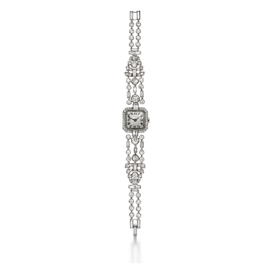 THE DUKE WATCH: AN ART DECO DIAMOND WRISTWATCH BY CARTIER, NEW YORK, 1935, WATCH FACE BY CHARLTON & CO., NEW YORK, 1922