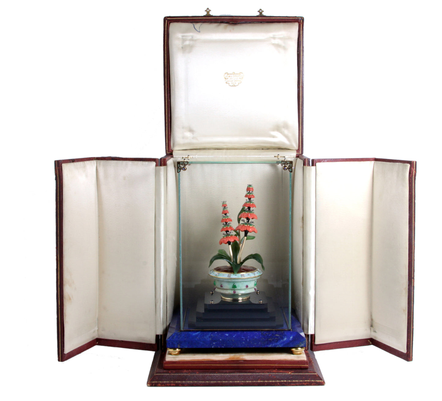 GEM-SET CORAL AND HARDSTONE POTTED FLOWER ANNULAR DESK CLOCK BY VERGER FRÈRES FOR OSTERTAG, PARIS, CIRCA 1929
