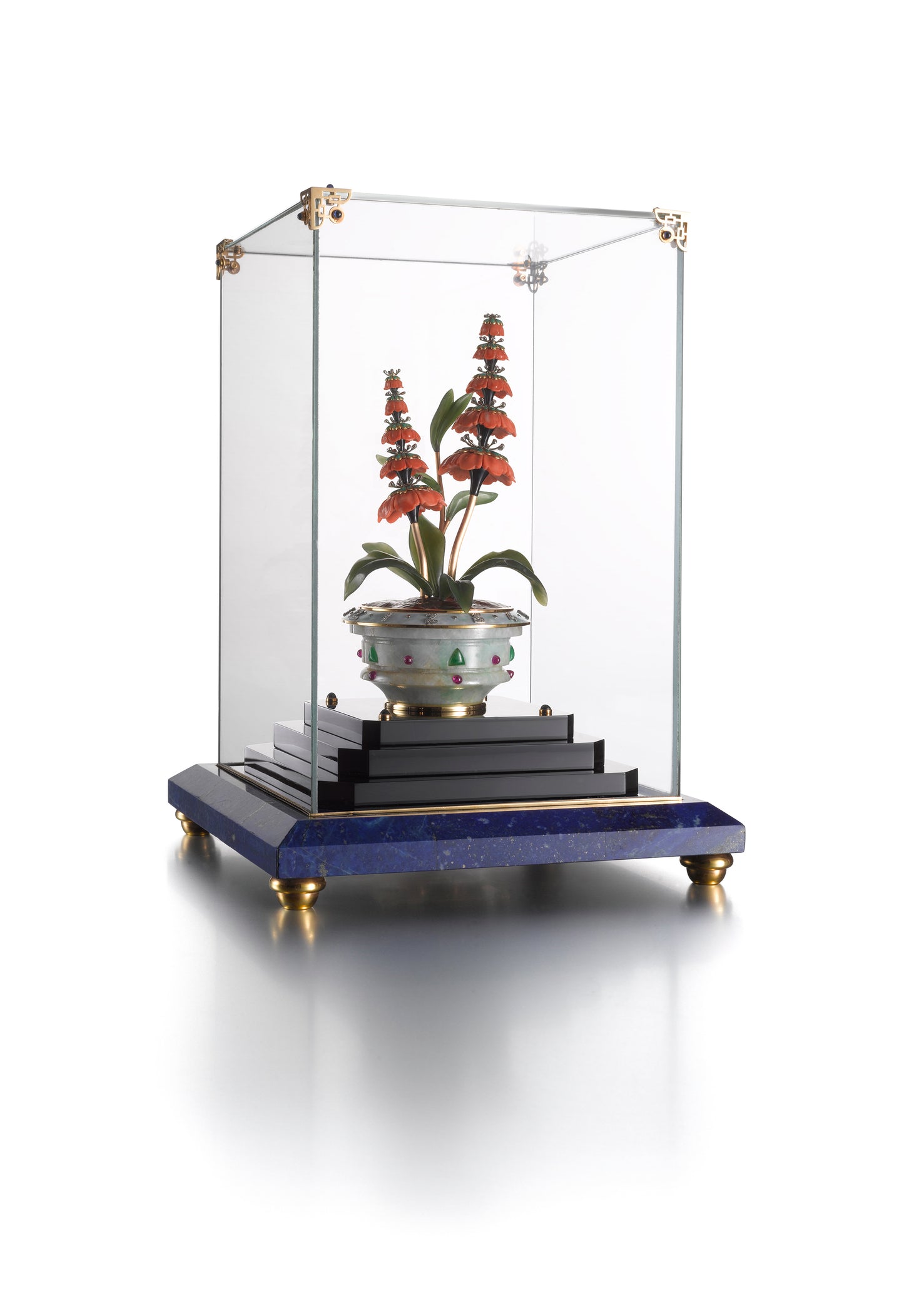 GEM-SET CORAL AND HARDSTONE POTTED FLOWER ANNULAR DESK CLOCK BY VERGER FRÈRES FOR OSTERTAG, PARIS, CIRCA 1929