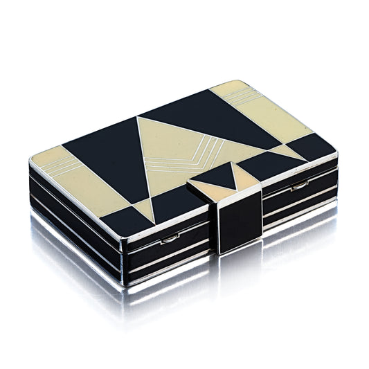 ART  DECO  CREAM  AND  BLACK  ENAMEL  VANITY  CASE BY  GÉRARD  SANDOZ,  PARIS,  CIRCA  1927