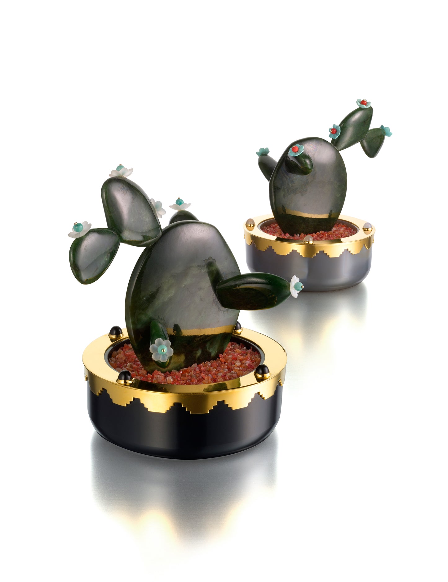 PAIR OF ART DECO SILVER GILT, SIBERIAN NEPHRITE, AGATE, ONYX, AND MULTI GEMSTONE FLOWERING CACTI BY CARTIER, PARIS, CIRCA 1925