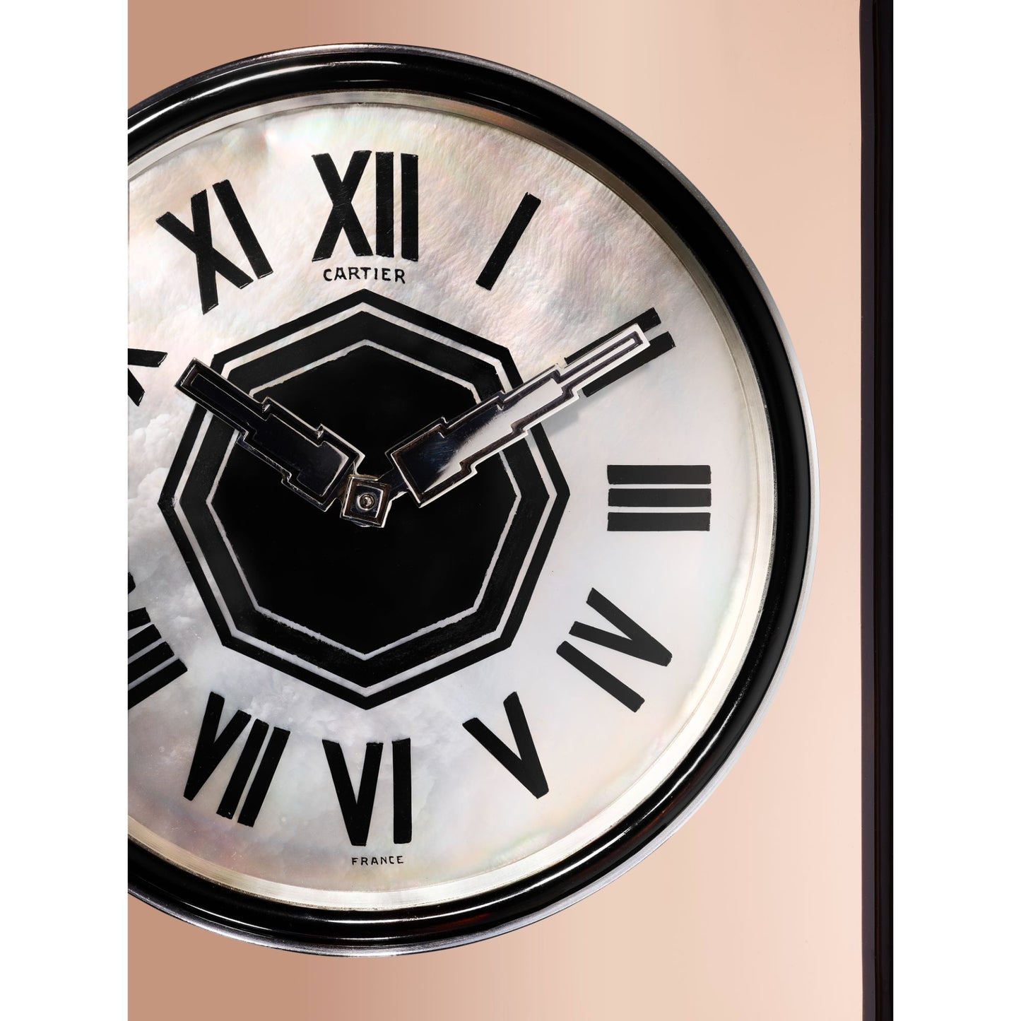 ART MODERNE MIRROR AND ENAMEL “LIGNE S” CLOCK BY CARTIER, PARIS, CIRCA 1930