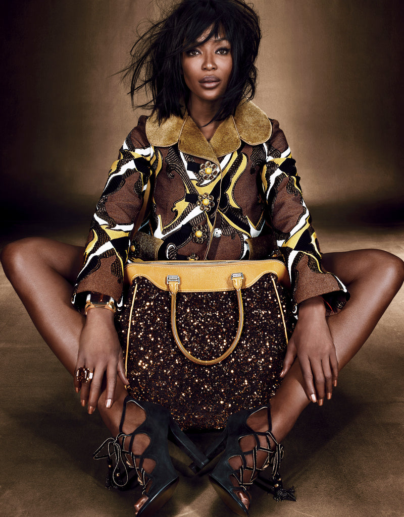 Naomi Campbell wearing the Cartier citrine cuff in W magazine.