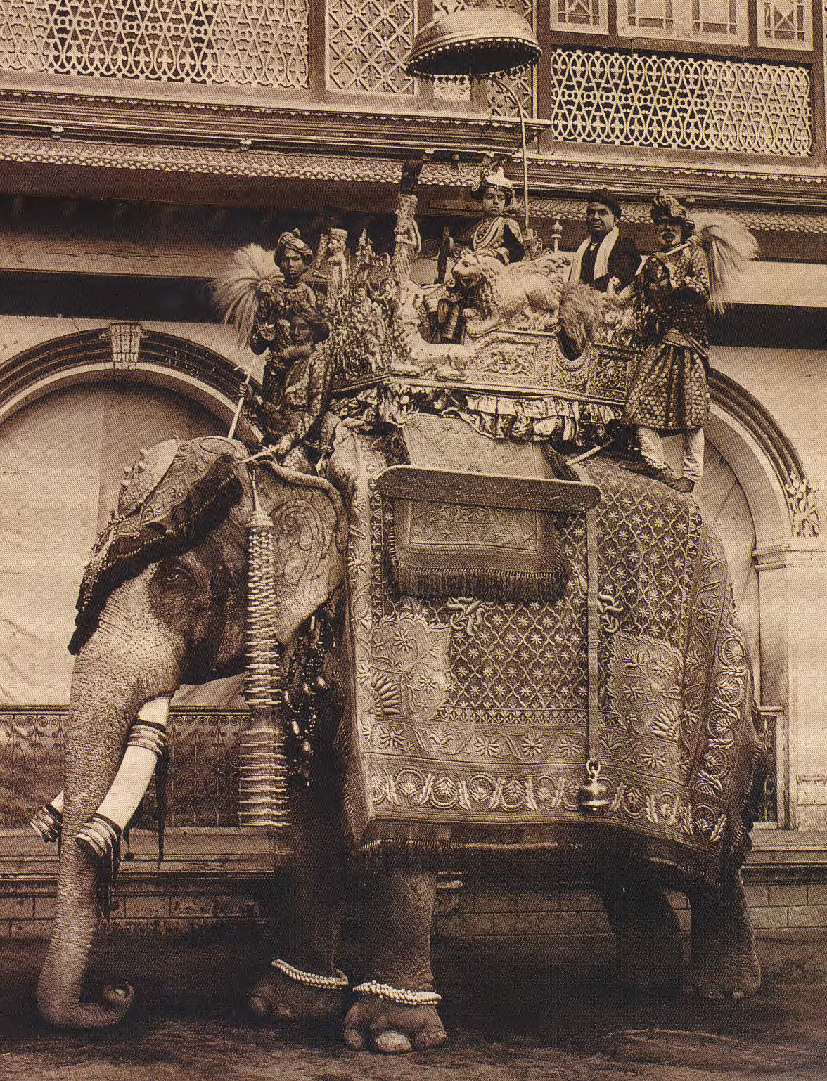 The  Maharajas  of  India  have  been  adorning  themselves  with  jewelry  for  more  than  five  thousand  years.  Associating  gems  and  jewels  with  religious  and  astronomical  significance  has  been  part  of  their  jewelry  experience.  The  ancient  Hindus  saw  their  gem-filled  subcontinent  as  a  blessing  from  the  gods;  to  them,  the  stone’s  allure  was  not  solely  limited  to  beauty.  The  above  image  depicts  the  son  of  a  Maharaja  riding  a  Royal  Elephant,  1910,  and  is  illustrated  in  Maharajas’  Jewels  by  Katherine  Prior  and  John  Adamson.