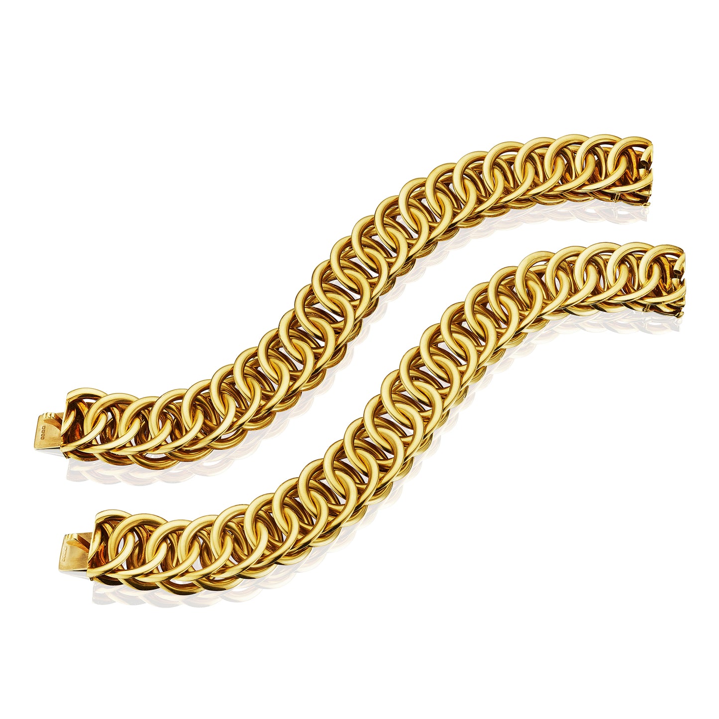 Pair of Gold Interlocking Link Bracelets by Cartier, London, 1960–1970