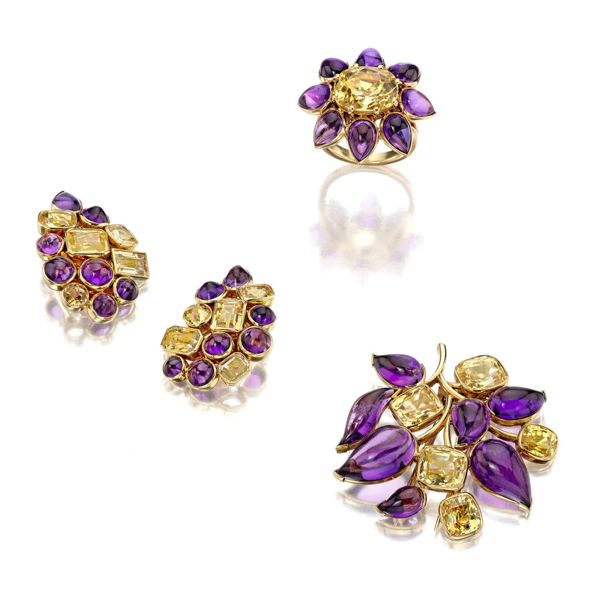 SUITE OF AMETHYST, YELLOW SAPPHIRE, AND CITRINE BROOCH, EAR CLIPS, AND RING BY SUZANNE BELPERRON, PARIS, 1951