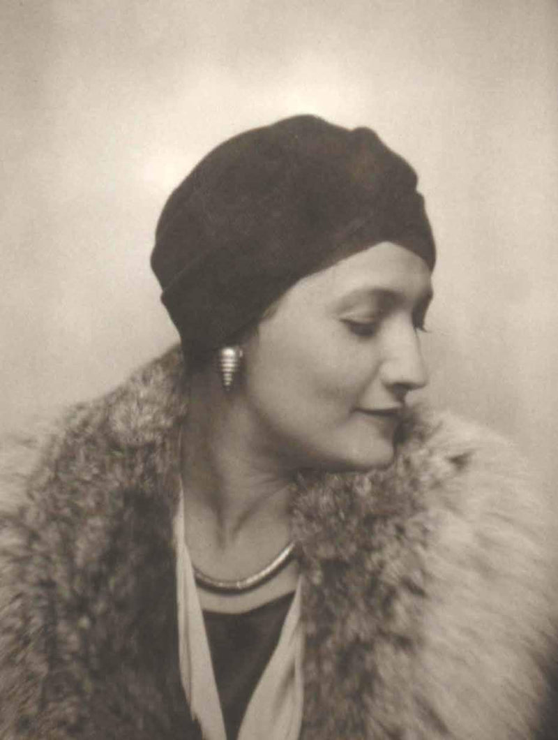 Suzanne Belperron wearing a Paul Poiret silk turban with jewelry of her own design.