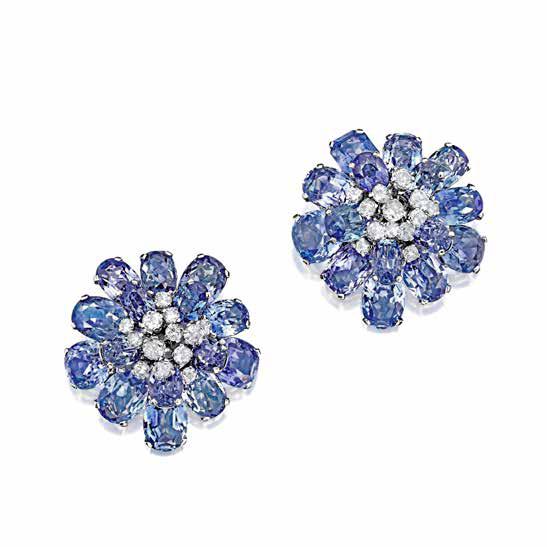 The flower clips are removable and can be worn as brooches.