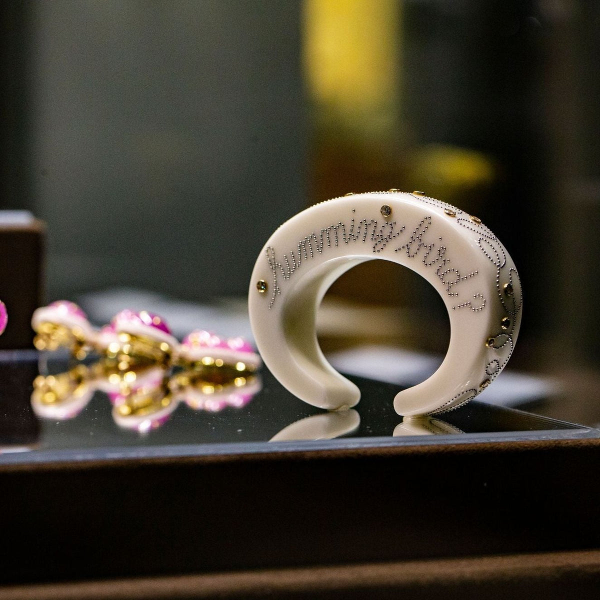BAKELITE, STEEL, GOLD, AND DIAMOND CUFF BRACELET BY DANIEL BRUSH, NEW YORK, CIRCA 2004