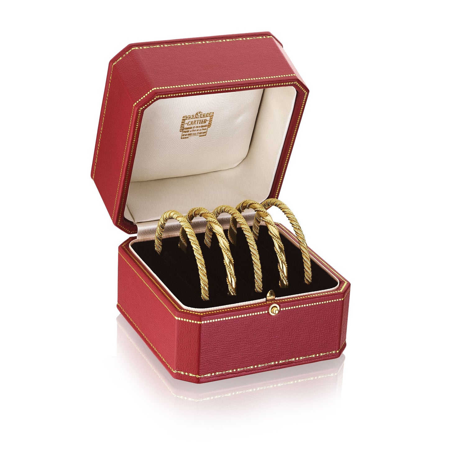 FIVE GOLD ROPE TWIST BANGLE BRACELETS BY CARTIER, CIRCA 1950