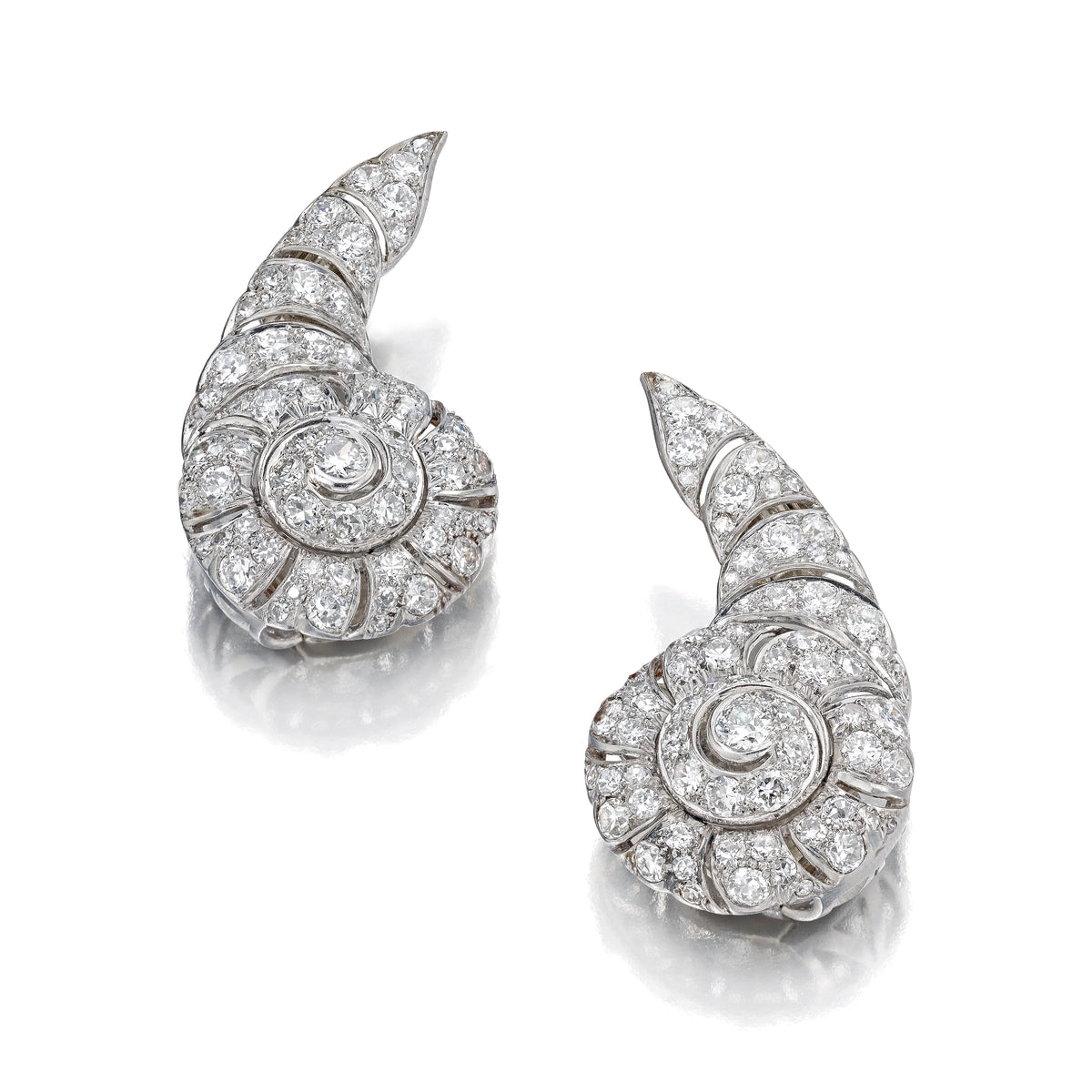 ART  DECO  DIAMOND  NAUTILUS-SHELL  EAR  CLIPS BY  SUZANNE  BELPERRON  FOR  RENÉ  BOIVIN,  PARIS,  1933
