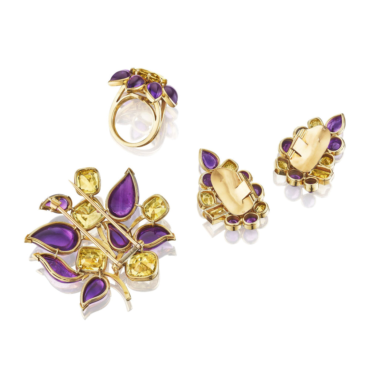 SUITE OF AMETHYST, YELLOW SAPPHIRE, AND CITRINE BROOCH, EAR CLIPS, AND RING BY SUZANNE BELPERRON, PARIS, 1951