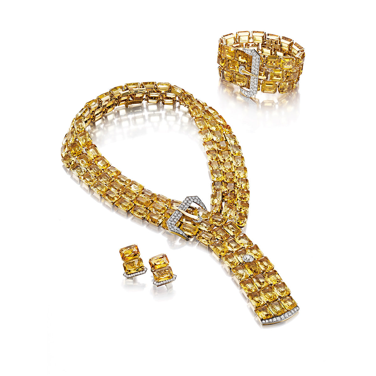 THE TIBBETT SUITE: A CITRINE AND DIAMOND BELT WITH A BUCKLE NECKLACE AND EARRINGS BY PAUL FLATO, NEW YORK, CIRCA 1940, BRACELET BY LAMBERT BROTHERS, NEW YORK, CIRCA 1950