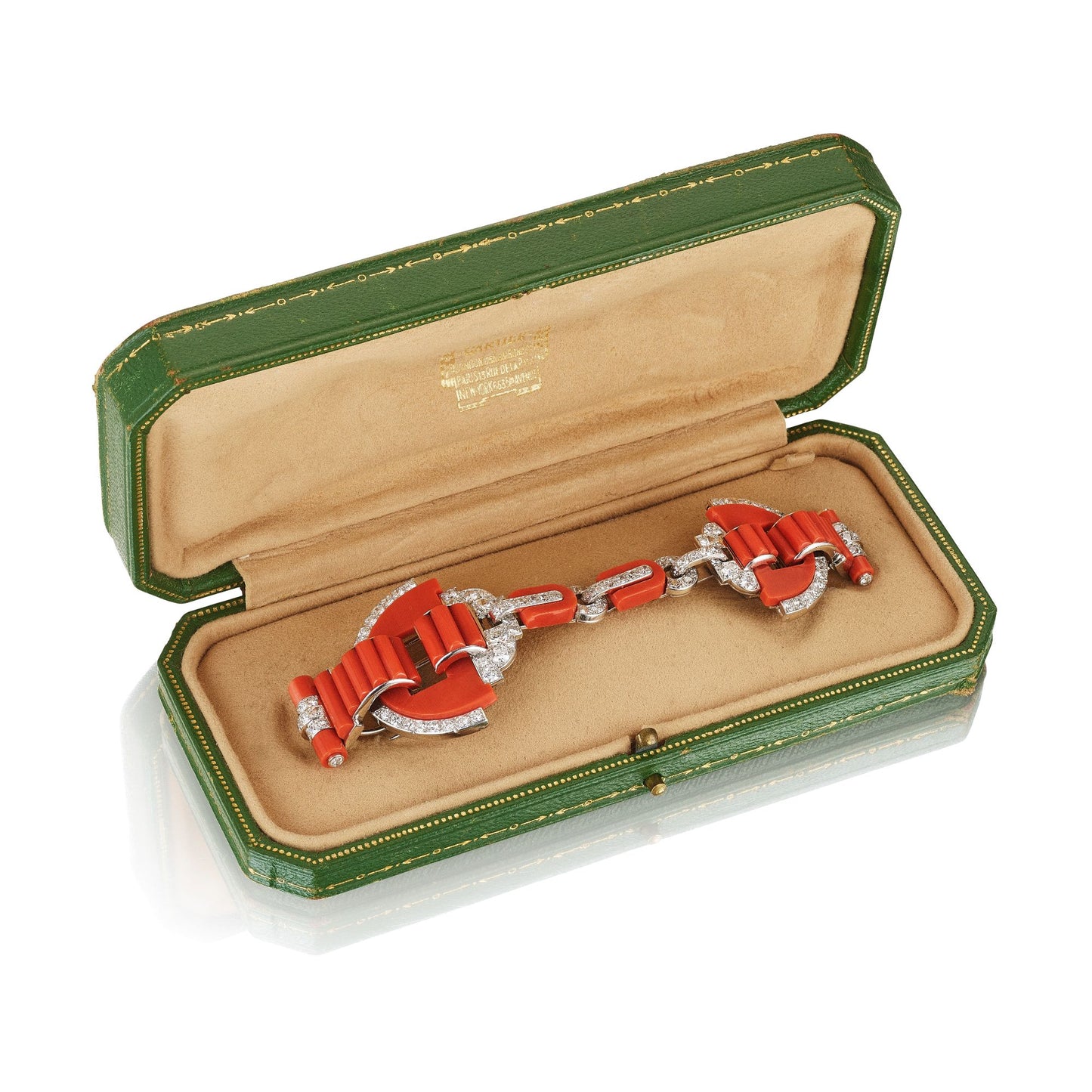 ART DECO CORAL AND DIAMOND CLOAK CLASP CONVERTIBLE TO CLIPS BY CARTIER, LONDON, CIRCA 1925
